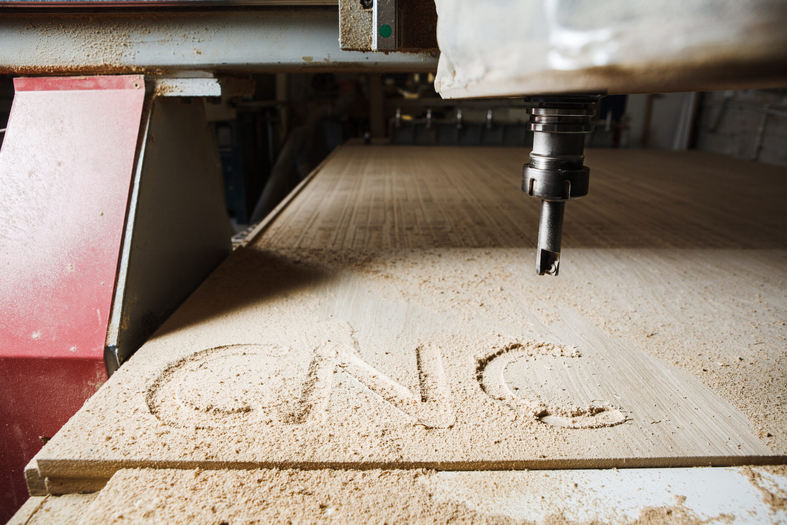 Frazier in cnc router. Computer numerical control machine. Woodwork industry.